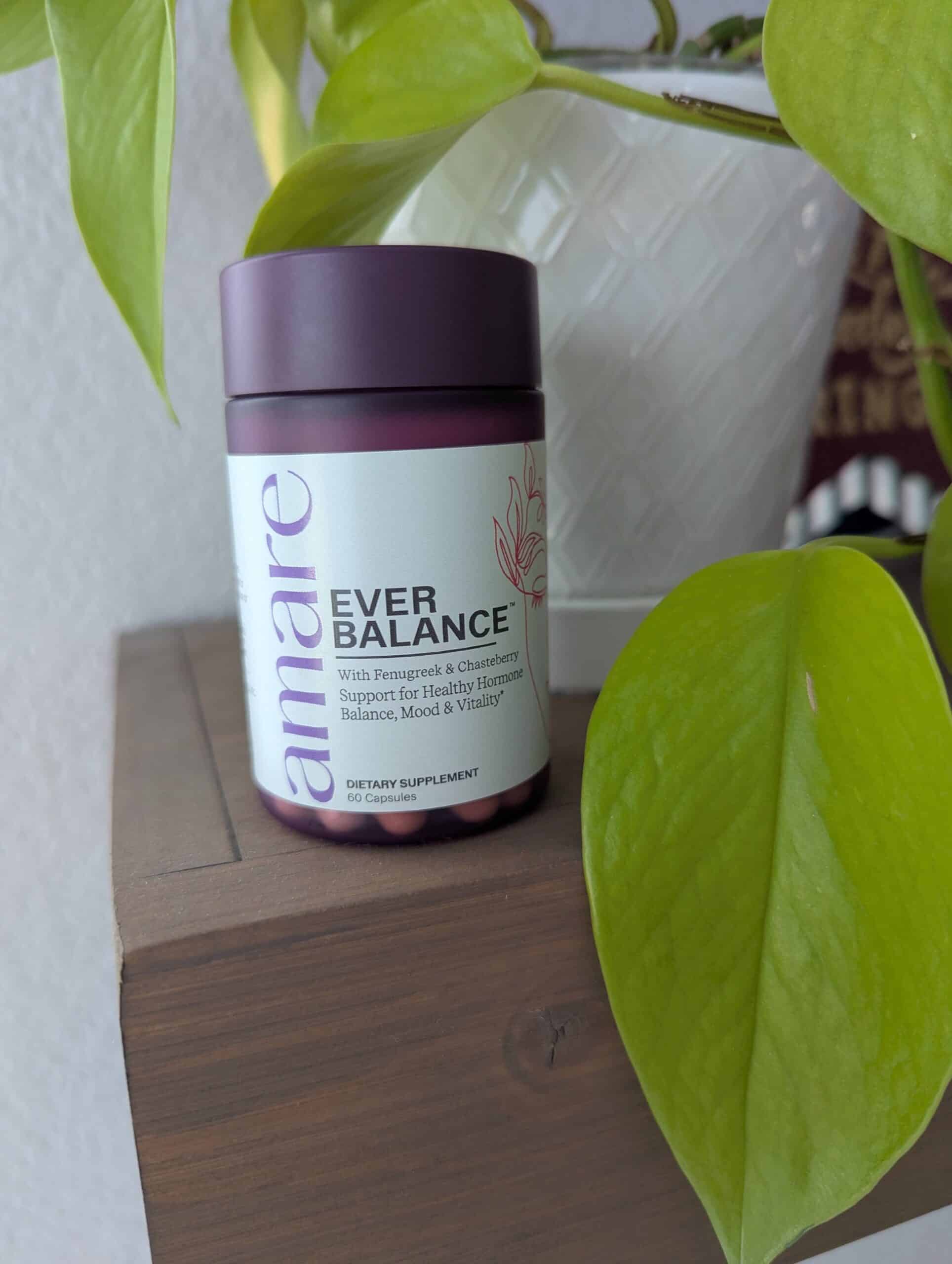Amare EverBalance bottle nestled among pothos leaves
